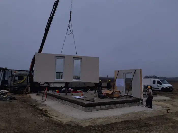 November 2020: The first wall panels go up by crane